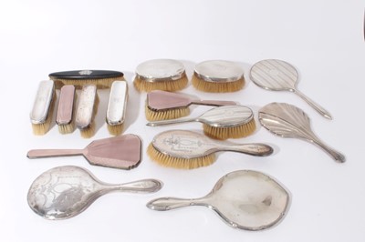 Lot 310 - George V Silver and guilloche enamel hand mirror and brush (Birmingham 1933) together with a group of assorted silver backed hand mirrors and brushes (14 pieces)