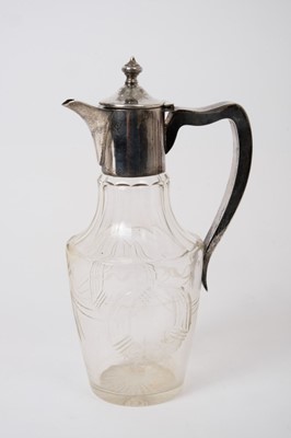 Lot 295 - George V cut glass liqueur decanter of tapered form with etched floral and swag decoration, star cut base and facet cut neck with silver mounted with domed