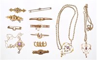 Lot 711 - Three Edwardian gold and gem set pendants on...