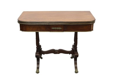 Lot 1208 - Regency mahogany card table with brass edging