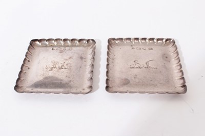 Lot 291 - Pair of late Victorian silver pin dishes of square form with scalloped borders, engraved double crests (Birmingham 1896) all at 3oz, each 8cm in diameter