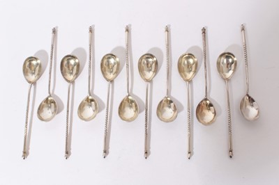 Lot 305 - Set of twelve Imperial Russian Silver spoons with Silver gilt teardrop bowls, engraved floral backs and twisted stems, stamped 'HW, all at 6.5oz