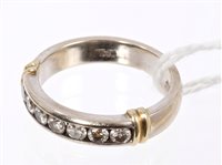 Lot 717 - Diamond eternity ring with a half hoop of...