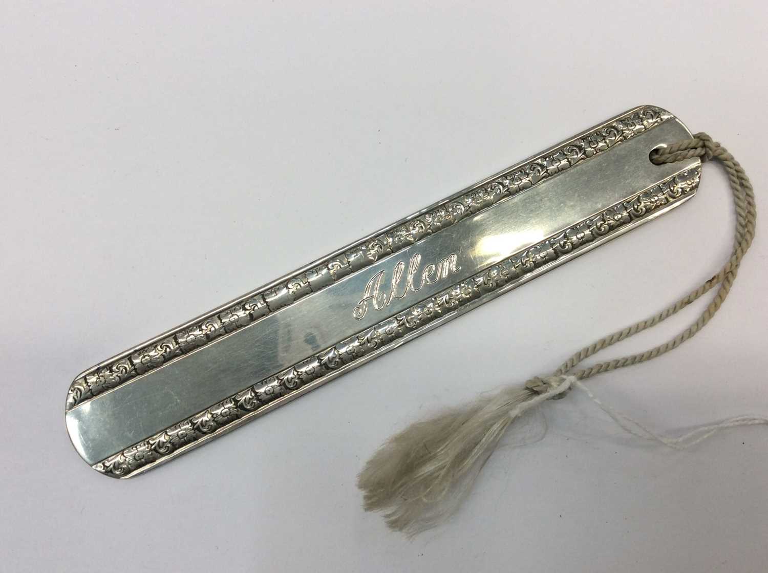 Lot 662 - Good quality silver plated bookmark engraved ‘Allen”