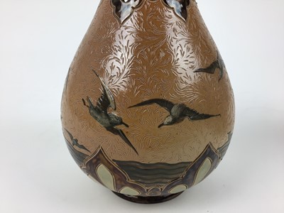 Lot 73 - Pair of Doulton Lambeth Florence Barlow vases decorated with birds