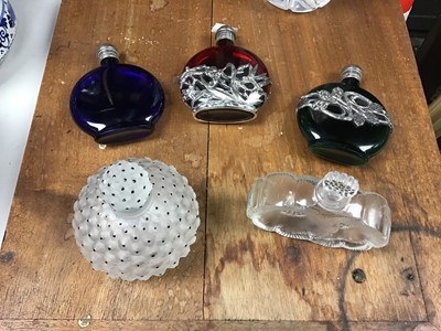 Lot 304 - Two Lalique scent bottles together with three others