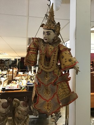 Lot 215 - Indonesian puppet with carved wooden head