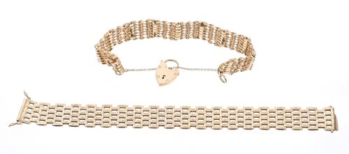 Lot 736 - Two 9ct gold gate bracelets