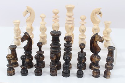 Lot 345 - 19th century ivory and stained ivory chess set