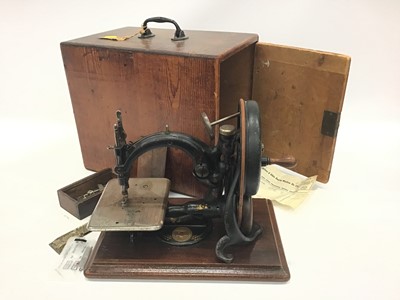 Lot 1916 - Wilcox and Gibbs sewing machine in case