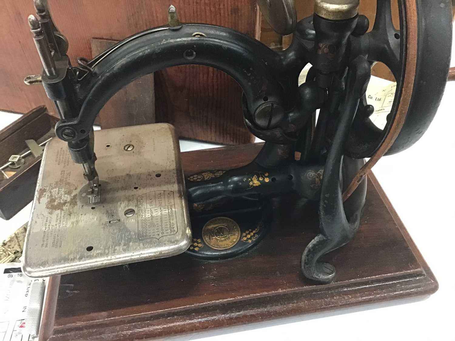 Lot 1916 Wilcox and Gibbs sewing machine in case