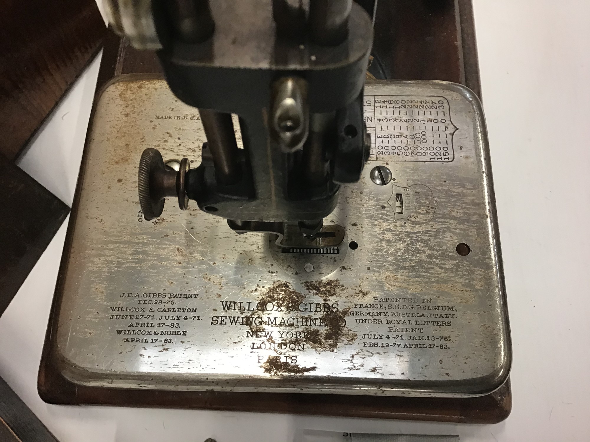 Lot 1916 Wilcox and Gibbs sewing machine in case
