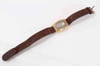 Lot 615 - 1920s mid-size Omega 18ct gold wristwatch with tonneau shape gold case, import hallmarks for Edinburgh 1928, on brown leather strap