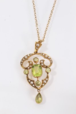 Lot 536 - Edwardian peridot and seed pearl pendant on pearl