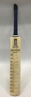 Lot 1873 - England v West Indies cricket bat signed by the England team