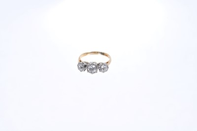 Lot 558 - Diamond three stone ring in collet setting on 18ct gold shank