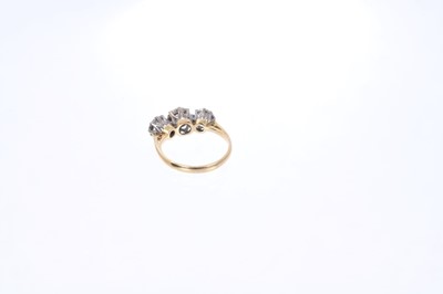 Lot 558 - Diamond three stone ring in collet setting on 18ct gold shank