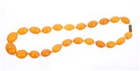 Lot 756 - Old amber necklace with a string of...