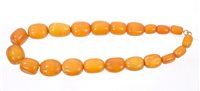 Lot 757 - Old amber necklace with a string of twenty-one...