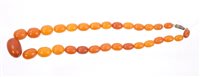 Lot 758 - Old amber necklace with a string of thirty...