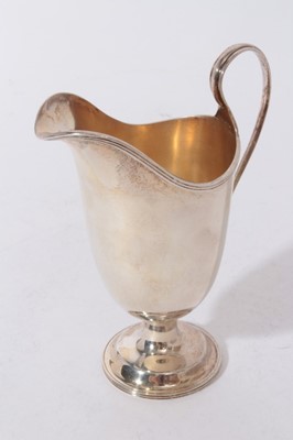 Lot 343 - Victorian silver helmet-shaped cream jug, on pedestal foot, 4.7ozs