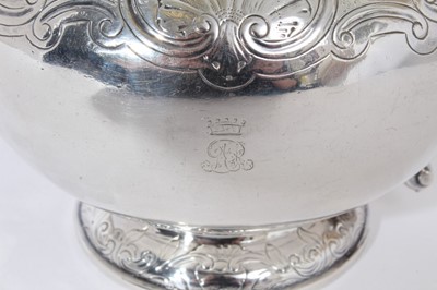 Lot 210 - George IV silver teapot of bullet form with chased scroll and shell decoration, engraved Ducal crown and initials, flush fitting hinged cover with ivory finial and ivory scroll handle, raised on pe...