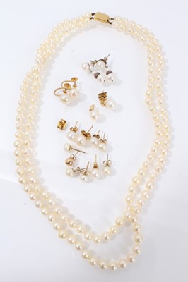 Lot 488 - Cultured pearl two strand necklace and a collection of cultured pearls stud earrings