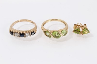 Lot 492 - 9ct gold sapphire and diamond five stone ring and a 9ct gold peridot dress ring and a pair of peridot earrings