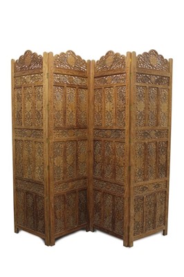 Lot 1247 - Indian carved hardwood and brass inlaid four- fold screen