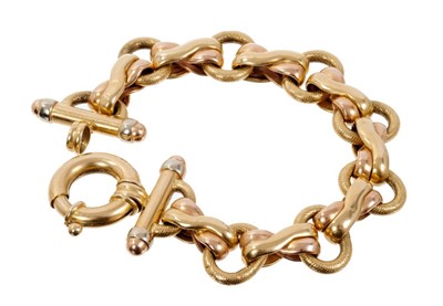 Lot 416 - 18ct gold bracelet with two-colour gold fancy links