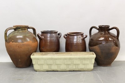 Lot 1259 - French ceramic window box, together with two Macedonian terracotta jars and two French twin handled jars