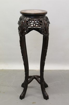 Lot 1262 - Early 20th century Chinese hardwood urn stand