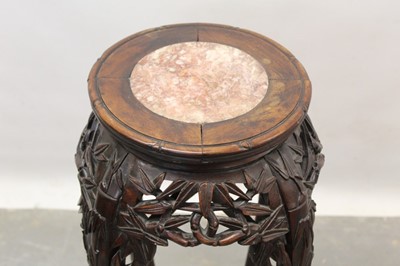 Lot 1262 - Early 20th century Chinese hardwood urn stand