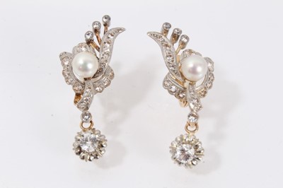 Lot 532 - Pair of 1920s gold and gem set earrings