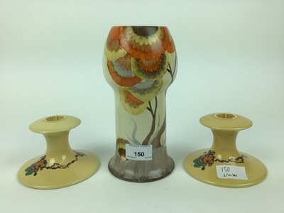 Lot 150 - Clarice Cliff vase and a pair of Clarice Cliff candlesticks