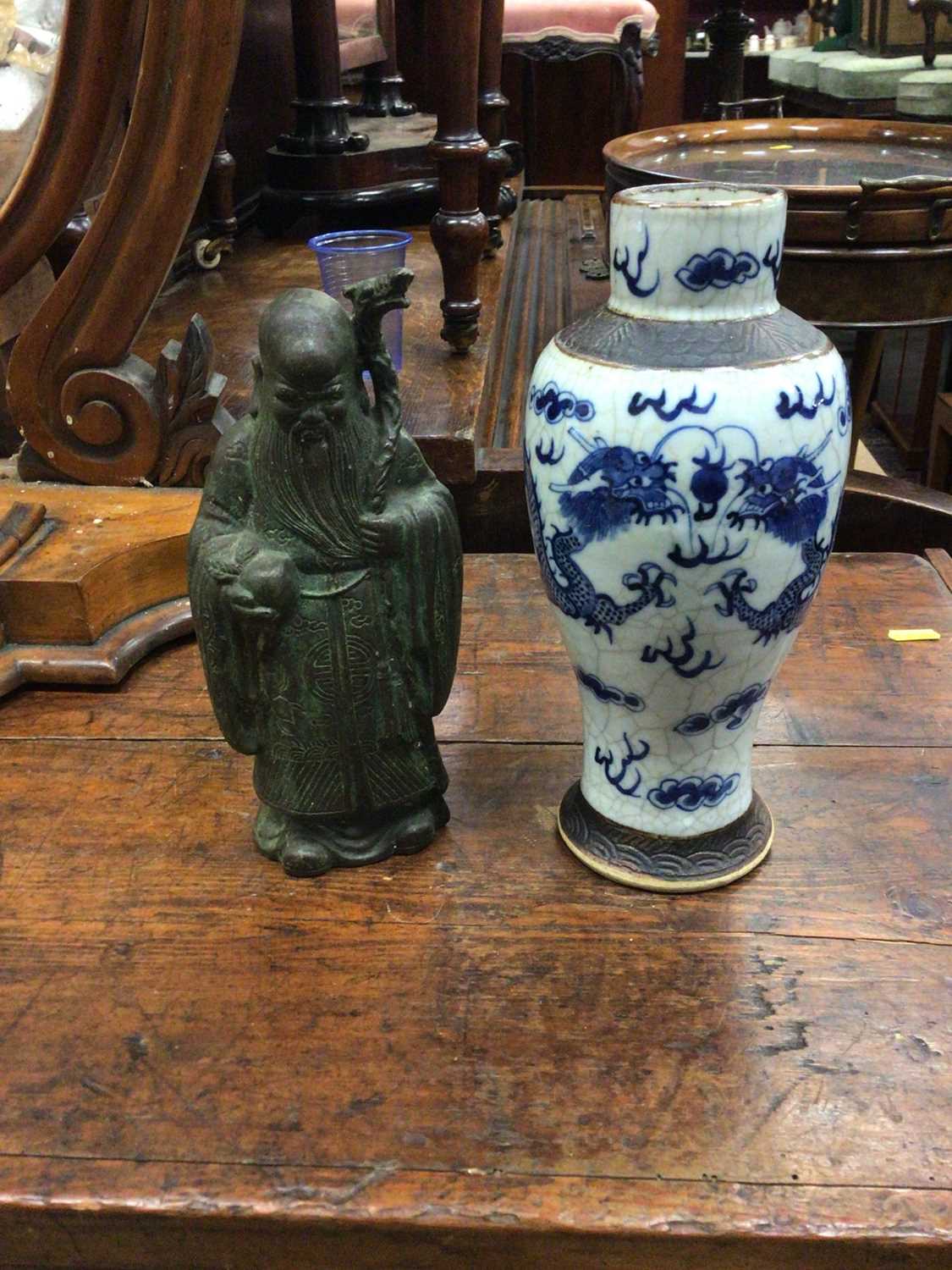 Lot 229 - Old Chinese porcelain crackle glazed vase and a Chinese bronze deity