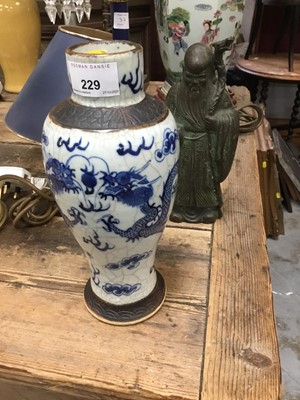 Lot 229 - Old Chinese porcelain crackle glazed vase and a Chinese bronze deity