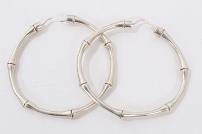 Lot 99 - Pair of Gucci silver 'bamboo' hoop, Swarovski jewellery and Valentino watch