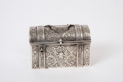 Lot 236 - 19th century Dutch silver casket of rectangular form with overall chased decoration, domed hinged cover and swing handle, import marks for London 1899, importer William Moering