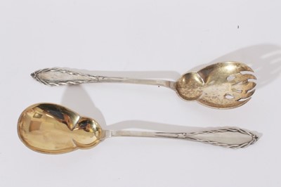 Lot 227 - Pair of early 20th Century Danish silver salad servers, with rope twist decoration, gilded bowls and engraved initals, marked for Copenhagen 1914 and also Christian F. Heise, all at approximately 6...