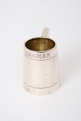 Lot 229 - Unusual early 20th Century Scandinavian silver Christening mug with band of planished decoration below engraved naming 'Dagmar' with triangular handle, base marked 828 s, Fahrner, all at 3.5oz, 7cm...