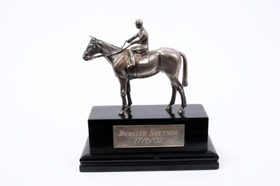 Lot 882 - Silver horse and jokey mounted on ebosnised wooden base