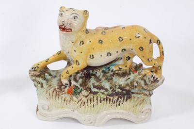 Lot 59 - Victorian Staffordshire figure of a leopard