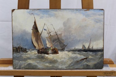 Lot 1064 - Edwin Hayes (1820-1904) oil on board laid on panel - vessels in squally seas off the coast, unframed, 23cm x 35cm