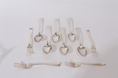 Lot 242 - Six George III Old English pattern silver table spoons together with four Hanoverian pattern silver dinner forks (various dates and makers) all at approximately 20.5oz