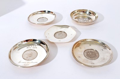 Lot 245 - Contemporary silver dish of circular form set with an 1821 Crown (London 1964) together with four other coin set dishes (various dates and makers), first dish 10cm in diameter (5)