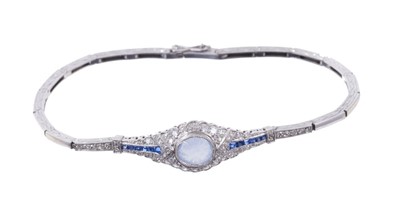 Lot 502 - Edwardian style diamond and sapphire bracelet with a carved cabochon blue sapphire surrounded by single cut diamonds and flanked by calibre cut sapphires on an articulated and engraved white gold b...