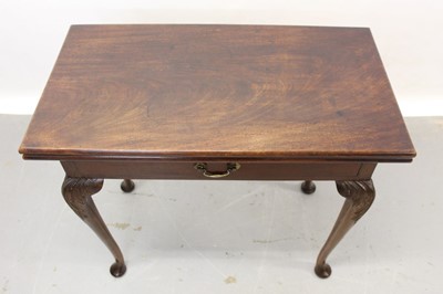 Lot 121 - George III style mahogany tea table