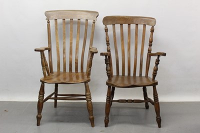 Lot 1344 - Two similar late 19th / early 20th century ash and elm lathe back chairs