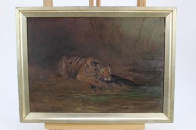 Lot 113 - Late 19th/early 20th century oil on panel - a tiger with its kill, initialled W.S.B, in gilt frame